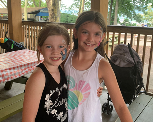 Two young girls with face painting at Kennywood